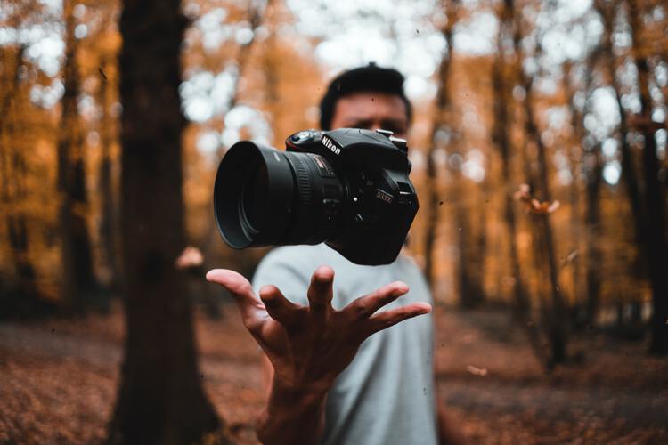 man throwing camera - free stock photos man throwing camera - free stock photos